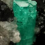 Beryl (variety emerald), Calcite<br />Muzo mining district, Western Emerald Belt, Boyacá Department, Colombia<br />58x31x34mm, xl aggregate=25x8mm<br /> (Author: Fiebre Verde)