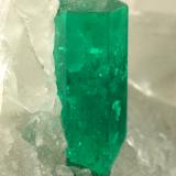 Beryl (variety emerald), Calcite<br />La Pita mining district, Municipio Maripí, Western Emerald Belt, Boyacá Department, Colombia<br />35x38x37mm, main xl=12x4mm<br /> (Author: Fiebre Verde)