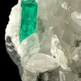 Beryl (variety emerald), Calcite<br />La Pita mining district, Municipio Maripí, Western Emerald Belt, Boyacá Department, Colombia<br />35x38x37mm, main xl=12x4mm<br /> (Author: Fiebre Verde)