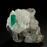 Beryl (variety emerald), Calcite<br />La Pita mining district, Municipio Maripí, Western Emerald Belt, Boyacá Department, Colombia<br />35x38x37mm, main xl=12x4mm<br /> (Author: Fiebre Verde)