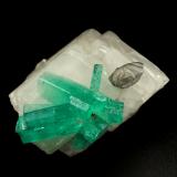 Beryl (variety emerald), Calcite, Dolomite<br />La Pita mining district, Cunas Mine, Municipio Maripí, Western Emerald Belt, Boyacá Department, Colombia<br />rhomb size=30x30x30mm, longest xl=18mm<br /> (Author: Fiebre Verde)