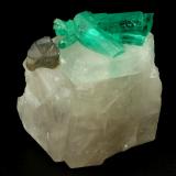 Beryl (variety emerald), Calcite, Dolomite<br />La Pita mining district, Cunas Mine, Municipio Maripí, Western Emerald Belt, Boyacá Department, Colombia<br />rhomb size=30x30x30mm, longest xl=18mm<br /> (Author: Fiebre Verde)