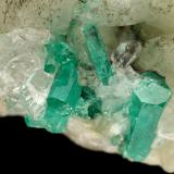 Beryl (variety emerald), Calcite, Quartz, GoethiteMina Peñas Blancas, Municipio San Pablo de Borbur, Cinturón Esmeraldífero Occidental, Departamento Boyacá, Colombia49x52x70mm, main xl=7x4mm (Author: Fiebre Verde)
