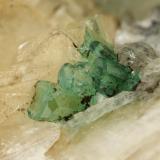 Beryl (variety emerald), Calcite, Quartz, Goethite<br />Peñas Blancas Mine, Municipio San Pablo de Borbur, Western Emerald Belt, Boyacá Department, Colombia<br />49x52x70mm, main xl=7x4mm<br /> (Author: Fiebre Verde)