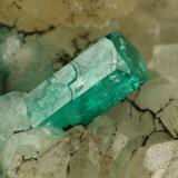 Beryl (variety emerald), Calcite, Quartz, Goethite<br />Peñas Blancas Mine, Municipio San Pablo de Borbur, Western Emerald Belt, Boyacá Department, Colombia<br />49x52x70mm, main xl=7x4mm<br /> (Author: Fiebre Verde)