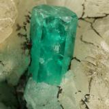 Beryl (variety emerald), Calcite, Quartz, GoethiteMina Peñas Blancas, Municipio San Pablo de Borbur, Cinturón Esmeraldífero Occidental, Departamento Boyacá, Colombia49x52x70mm, main xl=7x4mm (Author: Fiebre Verde)