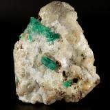 Beryl (variety emerald), Calcite, Quartz<br />Peñas Blancas Mine, Municipio San Pablo de Borbur, Western Emerald Belt, Boyacá Department, Colombia<br />105x130x50mm, largest xl=18mm<br /> (Author: Fiebre Verde)