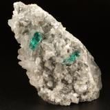 Beryl (variety emerald), Calcite, Dolomite, Pyrite<br />Chivor mining district, Municipio Chivor, Eastern Emerald Belt, Boyacá Department, Colombia<br />78x40x34mm, xls=12 & 11mm<br /> (Author: Fiebre Verde)