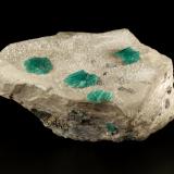 Beryl (variety emerald), Calcite, Dolomite, Pyrite<br />Chivor mining district, Municipio Chivor, Eastern Emerald Belt, Boyacá Department, Colombia<br />100x80x50mm, largest aggregate=17x13mm<br /> (Author: Fiebre Verde)