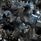 Pirargirita<br />Mina La Perla, Paraje de Los Pozos, Montejo de la Sierra, Comarca Sierra Norte, Comunidad de Madrid, España<br />Cristales de hasta 0,8 cm.<br /> (Autor: Ramón Jiménez)