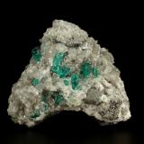 Beryl (variety emerald), Calcite, Dolomite, Pyrite<br />Chivor mining district, Municipio Chivor, Eastern Emerald Belt, Boyacá Department, Colombia<br />69x57x38mm, xls up to 10mm<br /> (Author: Fiebre Verde)