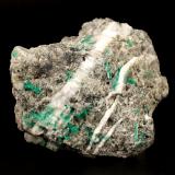 Beryl (variety emerald), Calcite, Pyrite<br />La Pita mining district, Cunas Mine, Municipio Maripí, Western Emerald Belt, Boyacá Department, Colombia<br />80x40x90mm - xls up to 8mm<br /> (Author: Fiebre Verde)