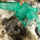 Beryl (variety emerald), Calcite, Dolomite, Pyrite<br />La Pita mining district, Cunas Mine, Municipio Maripí, Western Emerald Belt, Boyacá Department, Colombia<br />60x57x28mm, xls=20mm & 16mm<br /> (Author: Fiebre Verde)