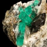 Beryl (variety emerald), Calcite, Dolomite, Pyrite<br />La Pita mining district, Cunas Mine, Municipio Maripí, Western Emerald Belt, Boyacá Department, Colombia<br />60x57x28mm, xls=20mm & 16mm<br /> (Author: Fiebre Verde)