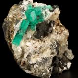 Beryl (variety emerald), Calcite, Dolomite, Pyrite<br />La Pita mining district, Cunas Mine, Municipio Maripí, Western Emerald Belt, Boyacá Department, Colombia<br />60x57x28mm, xls=20mm & 16mm<br /> (Author: Fiebre Verde)