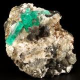 Beryl (variety emerald), Calcite, Dolomite, Pyrite<br />La Pita mining district, Cunas Mine, Municipio Maripí, Western Emerald Belt, Boyacá Department, Colombia<br />60x57x28mm, xls=20mm & 16mm<br /> (Author: Fiebre Verde)