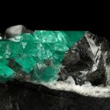 Beryl (variety emerald), Albite (variety cleavelandite), Dolomite<br />Chivor mining district, Municipio Chivor, Eastern Emerald Belt, Boyacá Department, Colombia<br />80x39x33mm, aggregate=35x16mm<br /> (Author: Fiebre Verde)