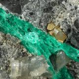 Beryl (variety emerald), Calcite, Dolomite, Pyrite<br />La Pita mining district, Municipio Maripí, Western Emerald Belt, Boyacá Department, Colombia<br />98x83x35mm, longest xl=20mm<br /> (Author: Fiebre Verde)