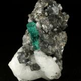 Beryl (variety emerald), Calcite, Dolomite, Pyrite<br />Chivor mining district, Municipio Chivor, Eastern Emerald Belt, Boyacá Department, Colombia<br />31x56x28mm, xl=19x6mm<br /> (Author: Fiebre Verde)