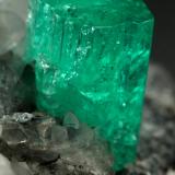 Beryl (variety emerald), Calcite, Dolomite, Pyrite<br />Coscuez mining district, Municipio San Pablo de Borbur, Western Emerald Belt, Boyacá Department, Colombia<br />27x24x35mm, xl=9x6mm<br /> (Author: Fiebre Verde)