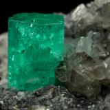 Beryl (variety emerald), Calcite, Dolomite, Pyrite<br />Coscuez mining district, Municipio San Pablo de Borbur, Western Emerald Belt, Boyacá Department, Colombia<br />27x24x35mm, xl=9x6mm<br /> (Author: Fiebre Verde)