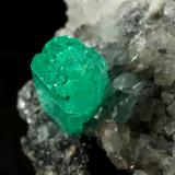 Beryl (variety emerald), Calcite, Dolomite, Pyrite<br />Coscuez mining district, Municipio San Pablo de Borbur, Western Emerald Belt, Boyacá Department, Colombia<br />27x24x35mm, xl=9x6mm<br /> (Author: Fiebre Verde)