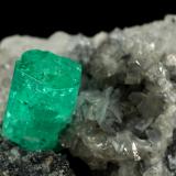 Beryl (variety emerald), Calcite, Dolomite, Pyrite<br />Coscuez mining district, Municipio San Pablo de Borbur, Western Emerald Belt, Boyacá Department, Colombia<br />27x24x35mm, xl=9x6mm<br /> (Author: Fiebre Verde)