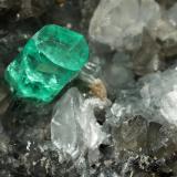 Beryl (variety emerald), Calcite, Dolomite, Pyrite, Quartz<br />La Pita mining district, Cunas Mine, Municipio Maripí, Western Emerald Belt, Boyacá Department, Colombia<br />66x49x24mm, main xl=6x4mm<br /> (Author: Fiebre Verde)