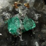 Beryl (variety emerald), Calcite, Dolomite, Pyrite, Quartz<br />La Pita mining district, Cunas Mine, Municipio Maripí, Western Emerald Belt, Boyacá Department, Colombia<br />66x49x24mm, main xl=6x4mm<br /> (Author: Fiebre Verde)