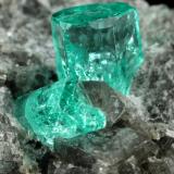 Beryl (variety emerald), Calcite, Dolomite<br />Chivor mining district, Municipio Chivor, Eastern Emerald Belt, Boyacá Department, Colombia<br />87x64x61mm, largest xl=5mm<br /> (Author: Fiebre Verde)