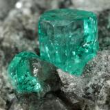 Beryl (variety emerald), Calcite, Dolomite<br />Chivor mining district, Municipio Chivor, Eastern Emerald Belt, Boyacá Department, Colombia<br />87x64x61mm, largest xl=5mm<br /> (Author: Fiebre Verde)