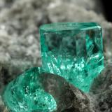 Beryl (variety emerald), Calcite, Dolomite<br />Chivor mining district, Municipio Chivor, Eastern Emerald Belt, Boyacá Department, Colombia<br />87x64x61mm, largest xl=5mm<br /> (Author: Fiebre Verde)