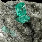 Beryl (variety emerald), Calcite, Dolomite<br />Chivor mining district, Municipio Chivor, Eastern Emerald Belt, Boyacá Department, Colombia<br />87x64x61mm, largest xl=5mm<br /> (Author: Fiebre Verde)
