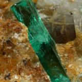 Beryl (variety emerald), Calcite<br />Peñas Blancas Mine, Municipio San Pablo de Borbur, Western Emerald Belt, Boyacá Department, Colombia<br />32x28x31mm, xl=14mm<br /> (Author: Fiebre Verde)