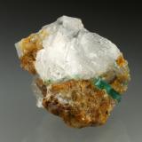 Beryl (variety emerald), Calcite<br />Peñas Blancas Mine, Municipio San Pablo de Borbur, Western Emerald Belt, Boyacá Department, Colombia<br />32x28x31mm, xl=14mm<br /> (Author: Fiebre Verde)