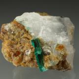 Beryl (variety emerald), Calcite<br />Peñas Blancas Mine, Municipio San Pablo de Borbur, Western Emerald Belt, Boyacá Department, Colombia<br />32x28x31mm, xl=14mm<br /> (Author: Fiebre Verde)