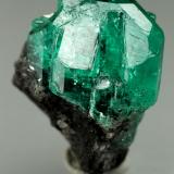 Beryl (variety emerald)<br />Chivor mining district, Municipio Chivor, Eastern Emerald Belt, Boyacá Department, Colombia<br />aggregate=18x13mm<br /> (Author: Fiebre Verde)