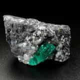 Beryl (variety emerald), Calcite, Dolomite, Pyrite<br />La Pita mining district, Cunas Mine, Municipio Maripí, Western Emerald Belt, Boyacá Department, Colombia<br />41x31x25mm, xl=17mm<br /> (Author: Fiebre Verde)