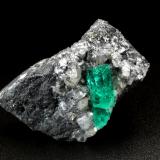 Beryl (variety emerald), Calcite, Dolomite, Pyrite<br />La Pita mining district, Cunas Mine, Municipio Maripí, Western Emerald Belt, Boyacá Department, Colombia<br />41x31x25mm, xl=17mm<br /> (Author: Fiebre Verde)