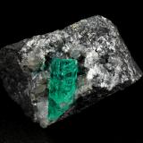 Beryl (variety emerald), Calcite, Dolomite, Pyrite<br />La Pita mining district, Cunas Mine, Municipio Maripí, Western Emerald Belt, Boyacá Department, Colombia<br />41x31x25mm, xl=17mm<br /> (Author: Fiebre Verde)