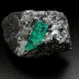 Beryl (variety emerald), Calcite, Dolomite, Pyrite<br />La Pita mining district, Cunas Mine, Municipio Maripí, Western Emerald Belt, Boyacá Department, Colombia<br />41x31x25mm, xl=17mm<br /> (Author: Fiebre Verde)