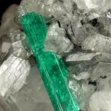 Beryl (variety emerald), Calcite, Dolomite<br />La Pita mining district, Municipio Maripí, Western Emerald Belt, Boyacá Department, Colombia<br />55x40x35mm, xl=22mm<br /> (Author: Fiebre Verde)