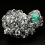 Beryl (variety emerald), Calcite<br />La Pita mining district, Municipio Maripí, Western Emerald Belt, Boyacá Department, Colombia<br />27x34x10mm, xl=10x4.5mm<br /> (Author: Fiebre Verde)