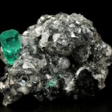 Beryl (variety emerald), Calcite<br />La Pita mining district, Municipio Maripí, Western Emerald Belt, Boyacá Department, Colombia<br />27x34x10mm, xl=10x4.5mm<br /> (Author: Fiebre Verde)