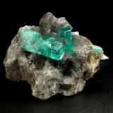 Beryl (variety emerald), Calcite, Pyrite<br />Chivor mining district, Municipio Chivor, Eastern Emerald Belt, Boyacá Department, Colombia<br />38x24x29mm, largest xl=17mm<br /> (Author: Fiebre Verde)