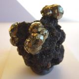 Pyrite on GalenaWest Fork Mine, West Fork, Viburnum Trend District, Reynolds County, Missouri, USA5 x 3 cm. (Author: Jordi Fabre)