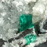 Beryl (variety emerald), Calcite, PyriteCoscuez (distrito minero), Municipio San Pablo de Borbur, Cinturón Esmeraldífero Occidental, Departamento Boyacá, Colombia70x65x43mm, xl=12mm (Author: Fiebre Verde)