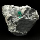 Beryl (variety emerald), Calcite, PyriteCoscuez (distrito minero), Municipio San Pablo de Borbur, Cinturón Esmeraldífero Occidental, Departamento Boyacá, Colombia70x65x43mm, xl=12mm (Author: Fiebre Verde)