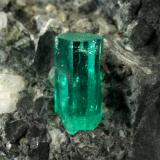 Beryl (variety emerald), Calcite, Pyrite<br />La Pita mining district, Municipio Maripí, Western Emerald Belt, Boyacá Department, Colombia<br />38x63x65mm, xl=10mm<br /> (Author: Fiebre Verde)