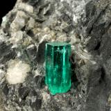 Beryl (variety emerald), Calcite, Pyrite<br />La Pita mining district, Municipio Maripí, Western Emerald Belt, Boyacá Department, Colombia<br />38x63x65mm, xl=10mm<br /> (Author: Fiebre Verde)